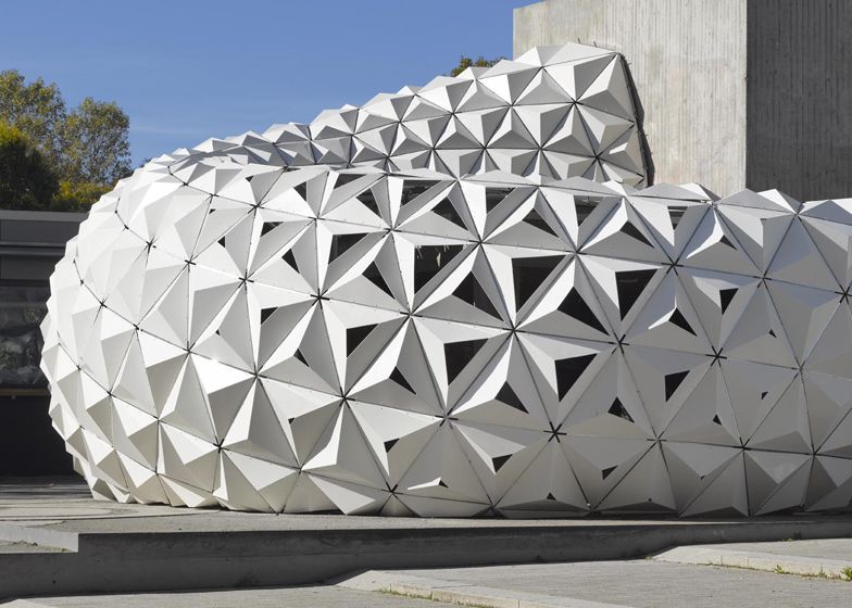 The white facade of the ArboSkin Pavilion built in bioplastic