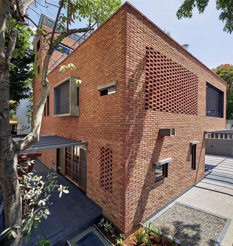 brick facade of the exterior walls with jali integrated at the Brick Abode