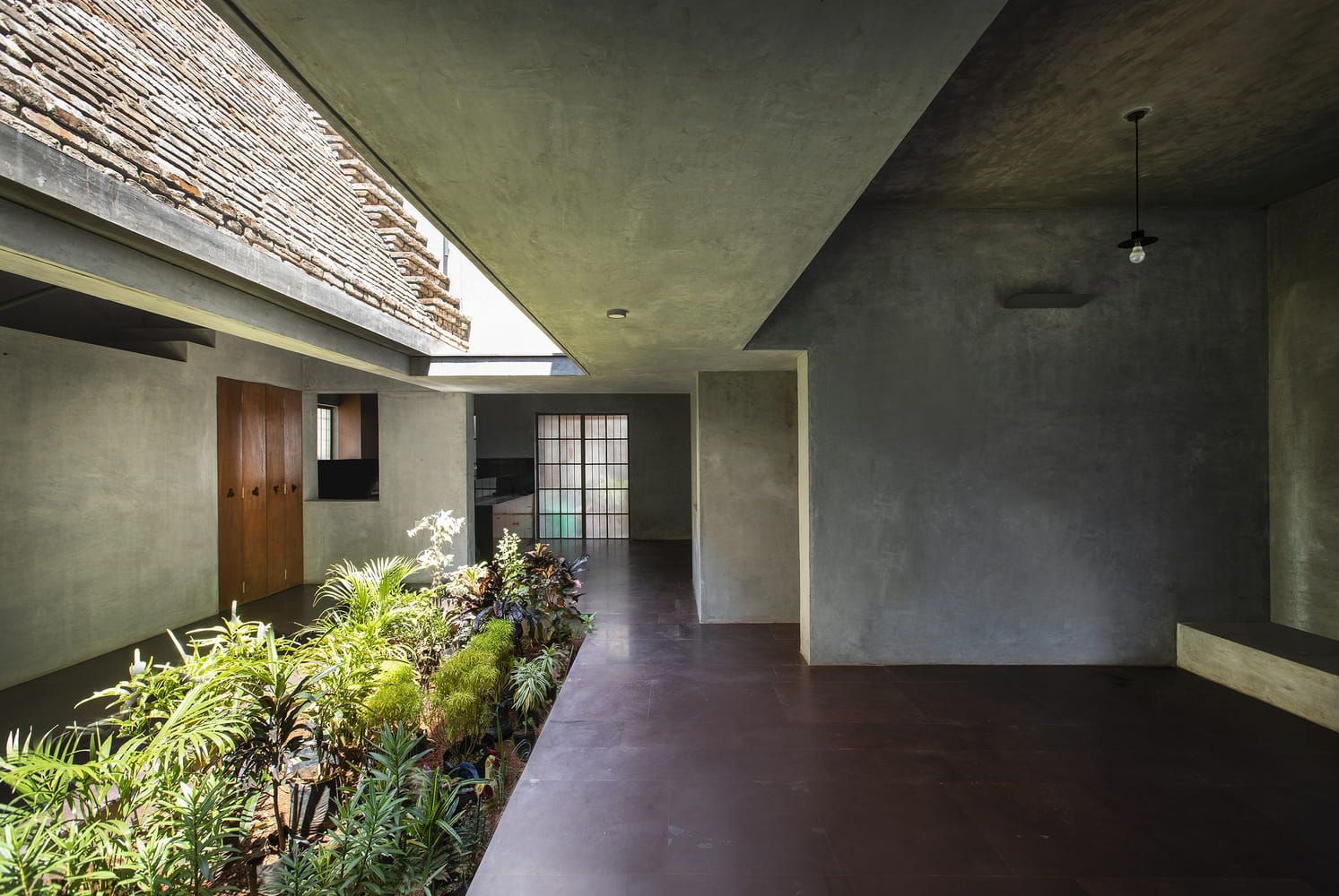 Image overlooking the centre open courtyard surrounded by the grey tones of the Court House