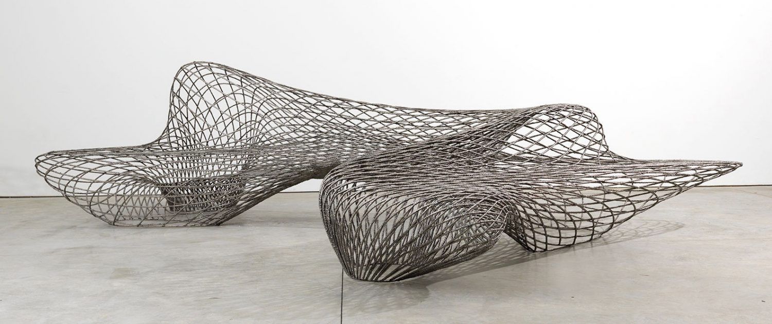 Dragon bench by Joris LaarmanLab displayed against a white wall