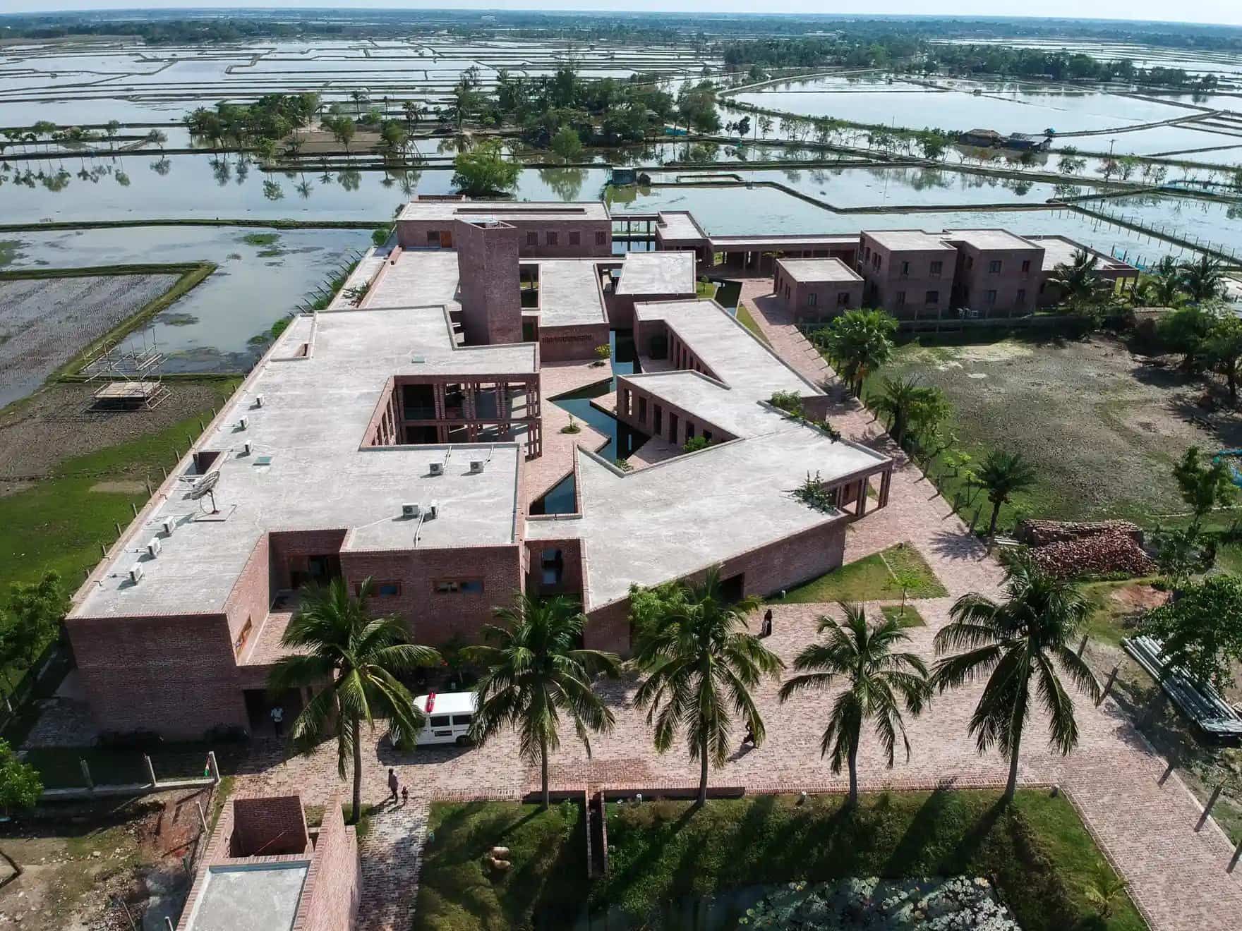 An aerial view of the Friendship Hospital seen against the surrounding rice fields