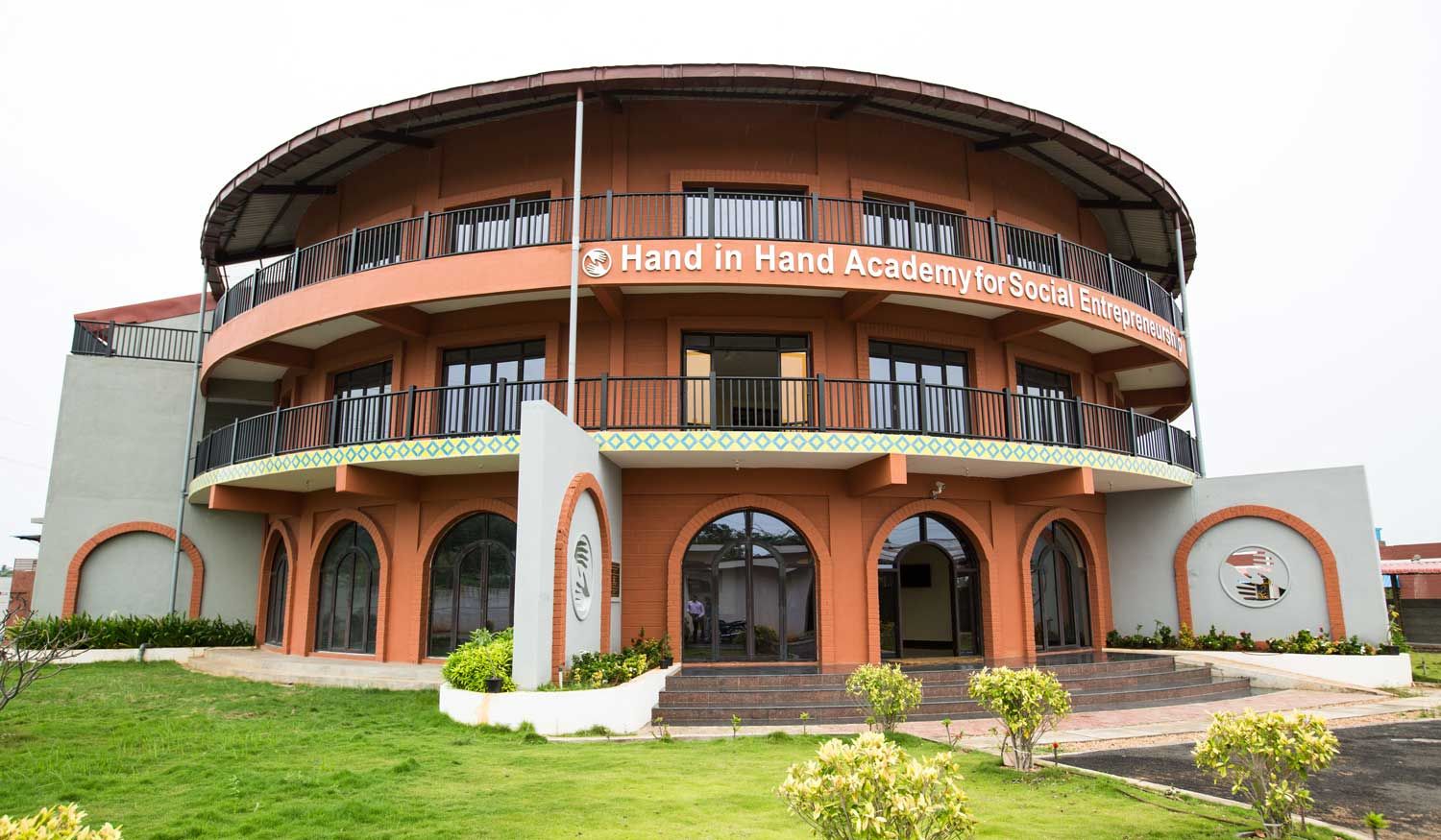 The front facade and the entrance of Hand in Hand Academy