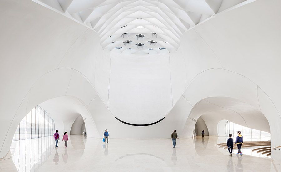 The interiors of Harbin Opera House with its domed ceiling and arches