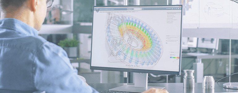 a designer working on a mechanical component with Solidworks modelling