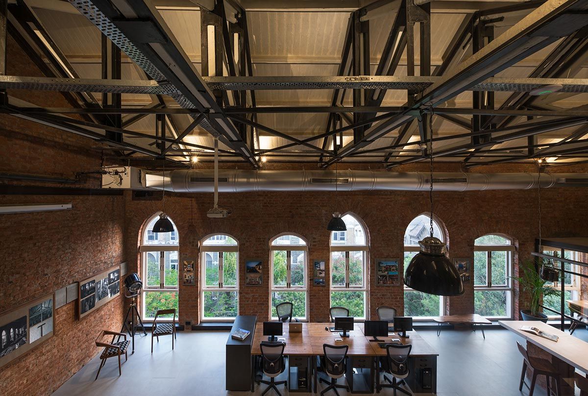 The steel structures and the brick walls of the interiors for the Loft office space