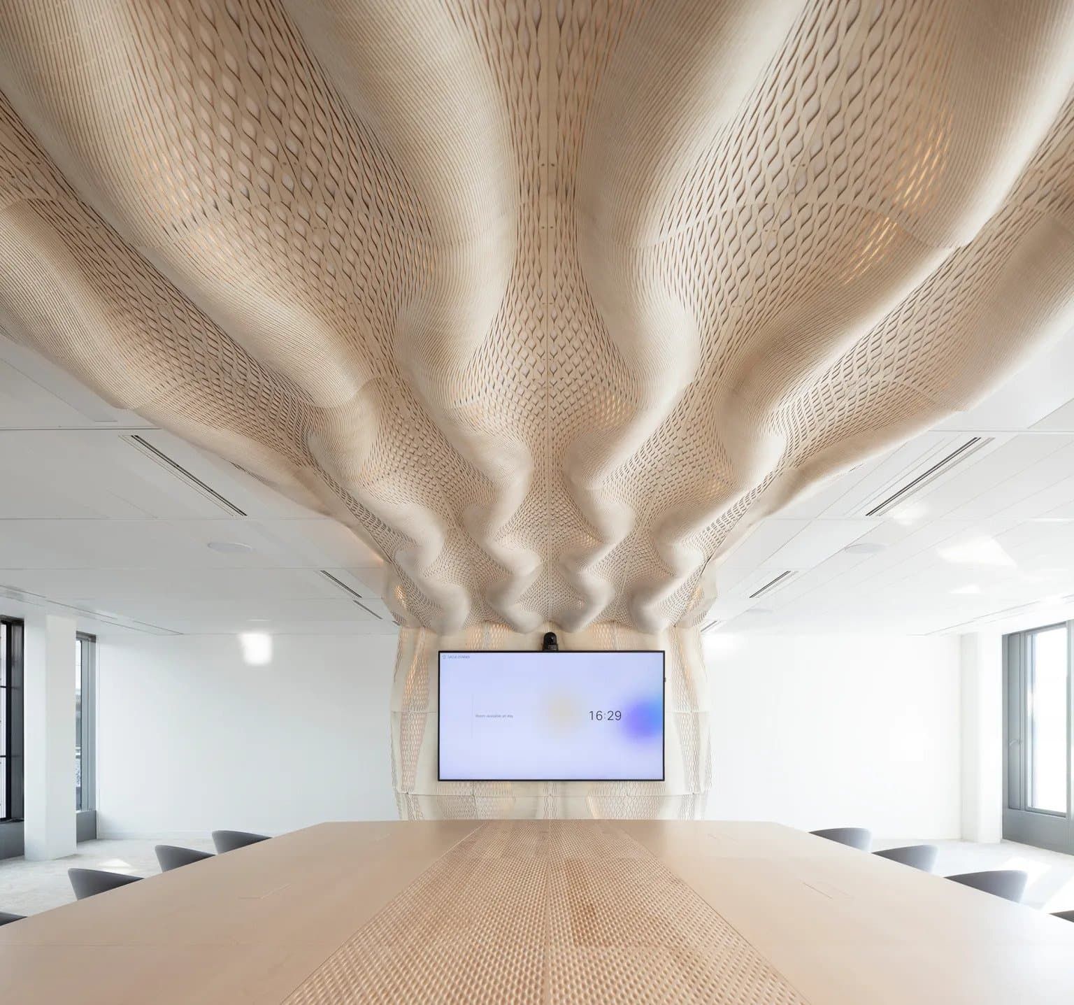 partial parametric ceiling of WoodenWaves inside an office