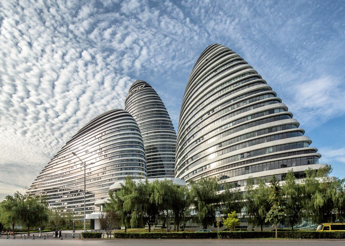 Zaha Hadid building, The Wangjing Soho in China, a curvilinear asymmetric skyscrape