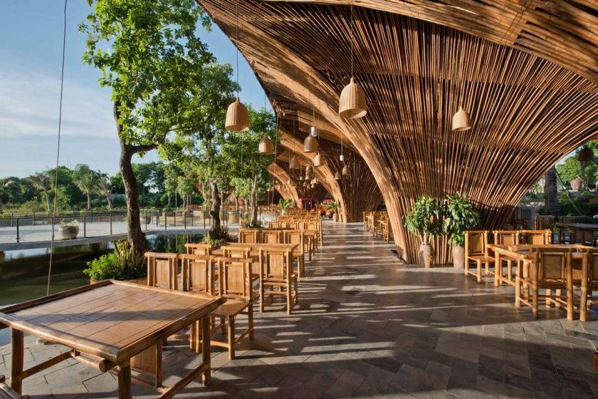 Semi-open restaurant with bamboo furniture and spread out columns