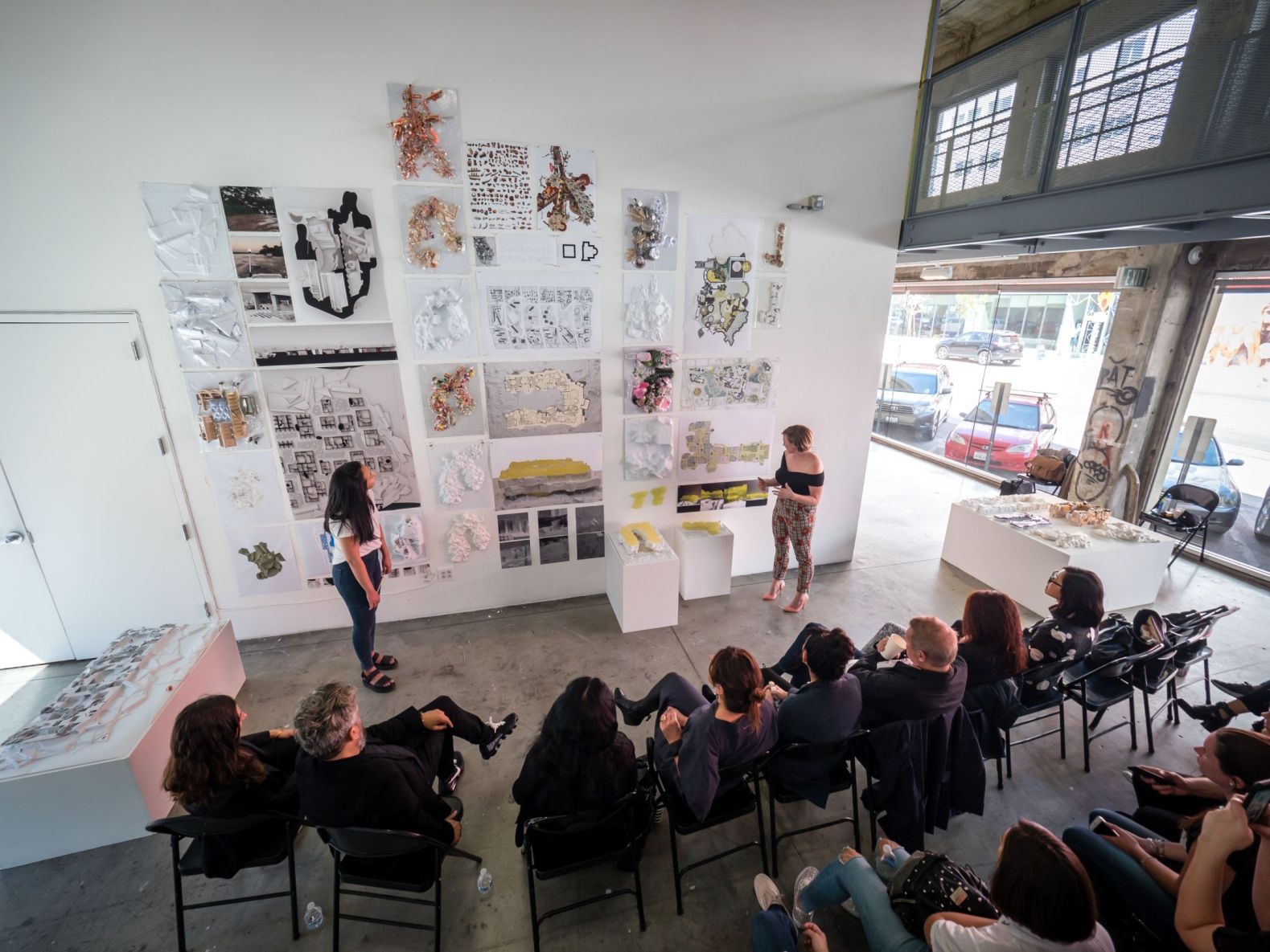 Students giving their architecture thesis review to the jurors