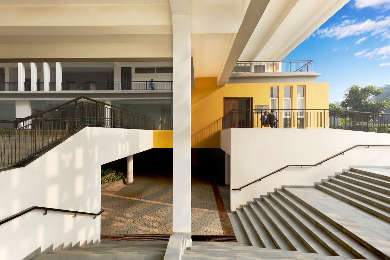 A transition space with stairs and ample natural light